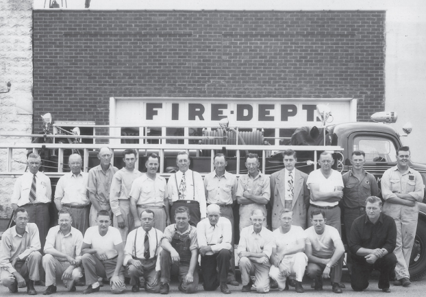 Wanamingo Fire Department members in front of the fire department