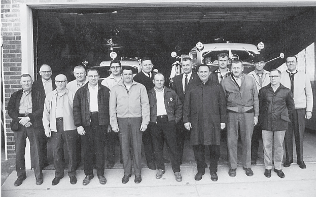 Wanamingo Fire Department members standing outside the fire hall